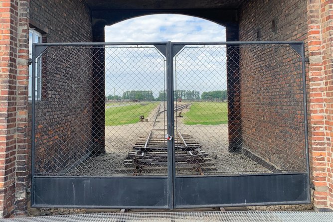 Auschwitz-Birkenau guided tour from Krakow with a private transport - Your Day, From Pickup to Two Camps in One Visit