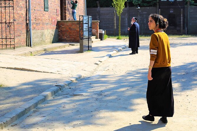 Auschwitz Birkenau: Live-Guided Tour with Transportation and Hotel Pickup - Entering Auschwitz: what you’ll actually see with a licensed guide