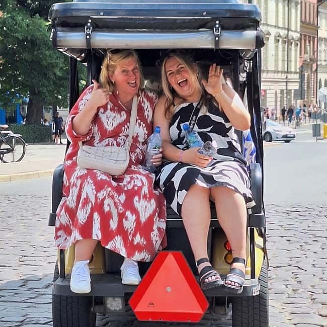 City Tour Cracow golf car plus Cruise on the Vistula River. - Town Hall to St. Francis, Bishop’s Palace, and Wawel views from the road