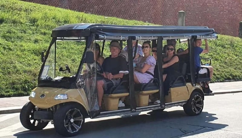 City Tour Cracow golf car plus Cruise on the Vistula River. - Szeroka Street photo time, Father Bernatek’s Bridge, and Podgórze context