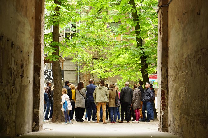 Discover the Dark Side of Warsaw in Praga District by Retro Bus - Film and everyday Warsaw: The Pianist street, Nowa Praga courtyards, and the zoo connection