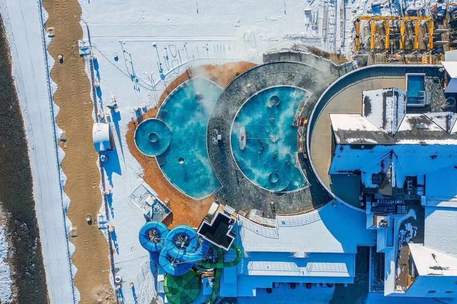 From Krakow: Chochołowskie Thermal Baths Ticket and Transfer - Hydromassage, water geysers, and the saline pool bonus