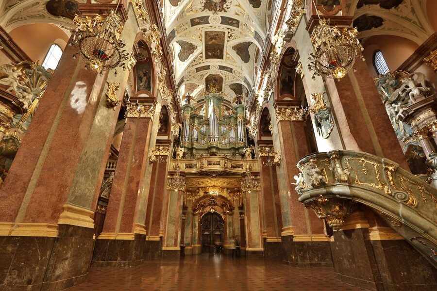 From Krakow: Częstochowa "Black Madonna" Day Tour - Church of St. Cross and the monastery defenses you can still read