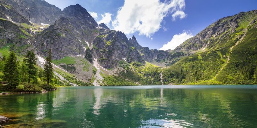 From Krakow: Morskie Oko Lake Tour in the Tatra Mountains - Arriving at Morskie Oko: glacier origins and peak-framed views