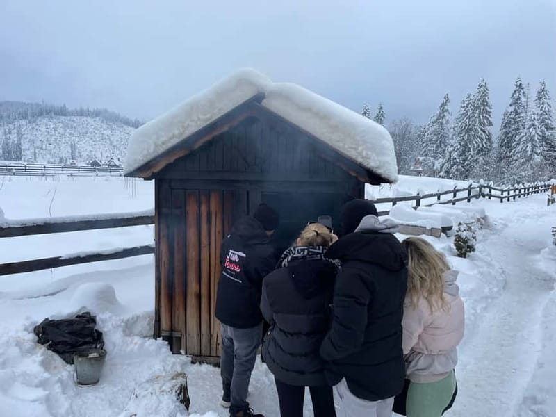 From Krakow: Snowmobile, Zakopane & Chochołowskie Baths - Grilling oscypek over a firepit, then warming up with local flavors