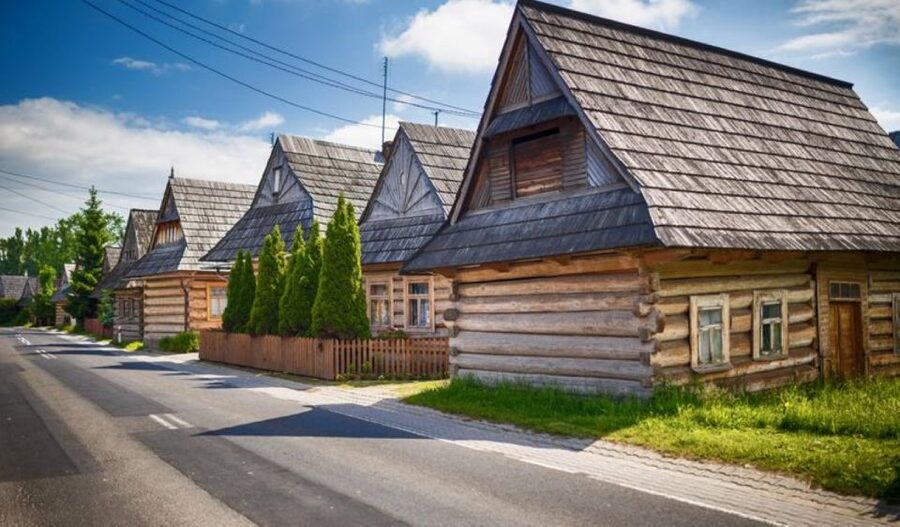 From Krakow: Zakopane & Tatra Mountains Tour with Cable Car - Zakopane ski-jump views and Jaszczurówka Chapel photo time