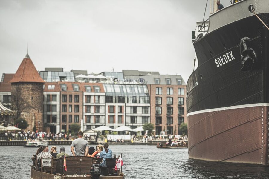 Gdansk: City Cruise on Historical Polish Boat - Canals and the working port: the reason small boats earn their keep