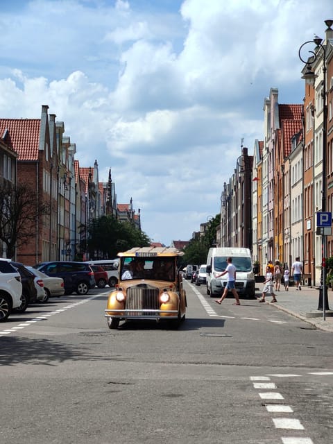 Gdansk: City Sightseeing Tour Eco Electric Buggy Golf Cart - Languages and guides: live narration plus audio support