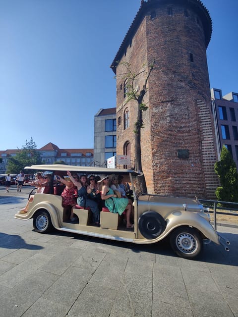 Gdansk: City Sightseeing Tour Eco Electric Buggy Golf Cart - Group vs private: who gets hotel pickup and how to plan your timing