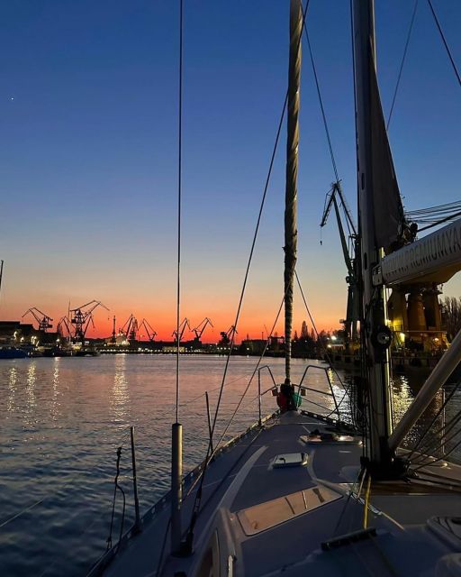 Gdańsk: Scenic Sunset Cruise with Welcome Drink - Shipyard Watching: Cranes, Dry Docks, and Remontowa Shiprepair