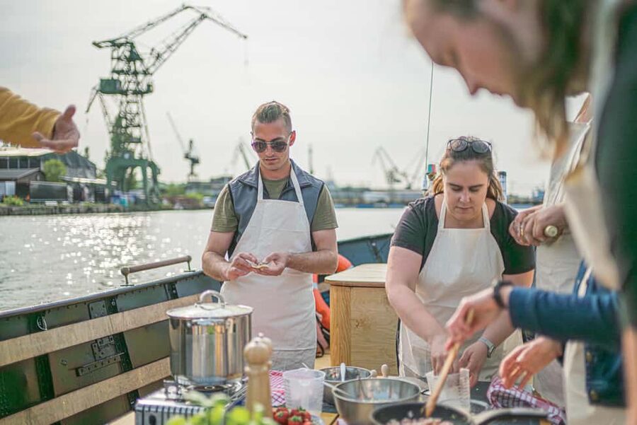 Gdańsk: Shipyard and Port Cruise with Pierogi Tasting - The guide, the group vibe, and how the tour teaches without lecturing