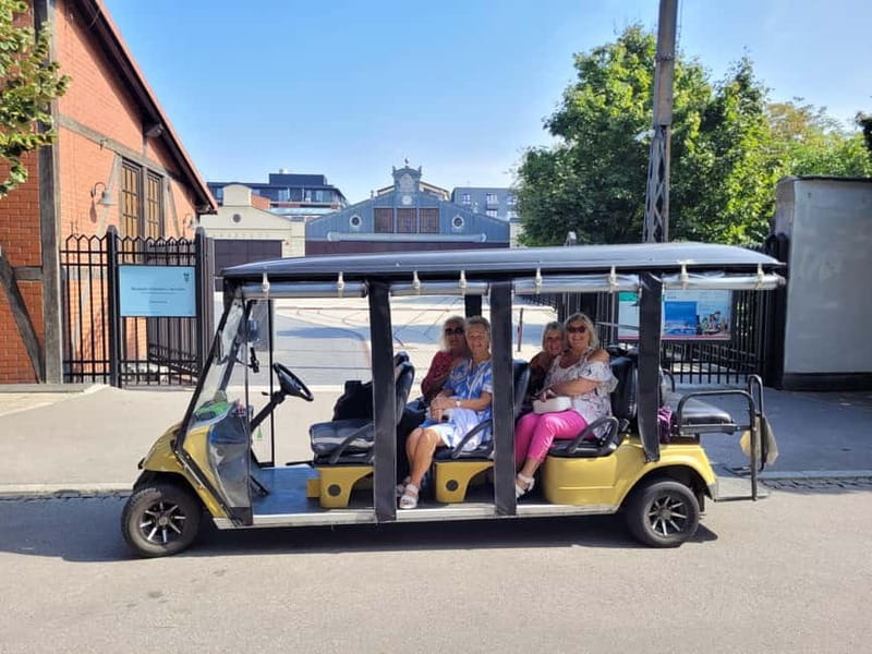 Krakow: City Sightseeing Tour by Electric Buggy Golf Cart - How the audio guide and driver work together
