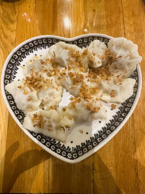 Krakow: Hidden Gems Food and Culture Tour for Small Groups - The first restaurant tasting: pierogi and kompot, the comfort-food combo