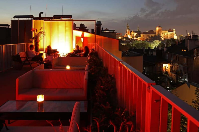 Krakow: Hidden Rooftop Bar Reservation with 1 Cocktail - Finding Holiday Suites Cracow, Then Climbing to the Terrace