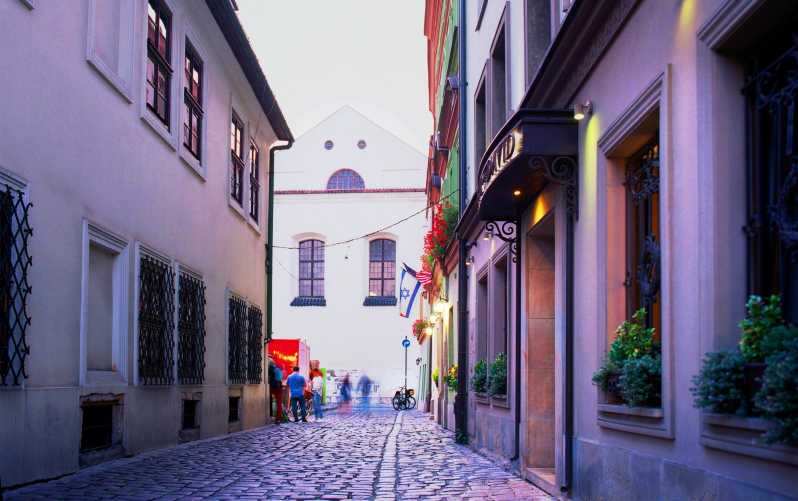 Krakow: Jewish Quarter and Former Ghetto Tour by Golf Cart - Ghetto Heroes Square, empty chairs, and how the route builds emotion