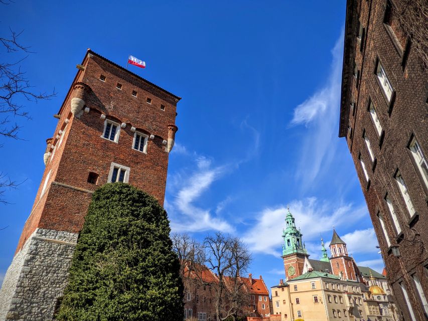 Kraków: Old Town & Wawel Castle Walking Tour in English - Barbican and medieval walls, why Krakow guarded itself so fiercely