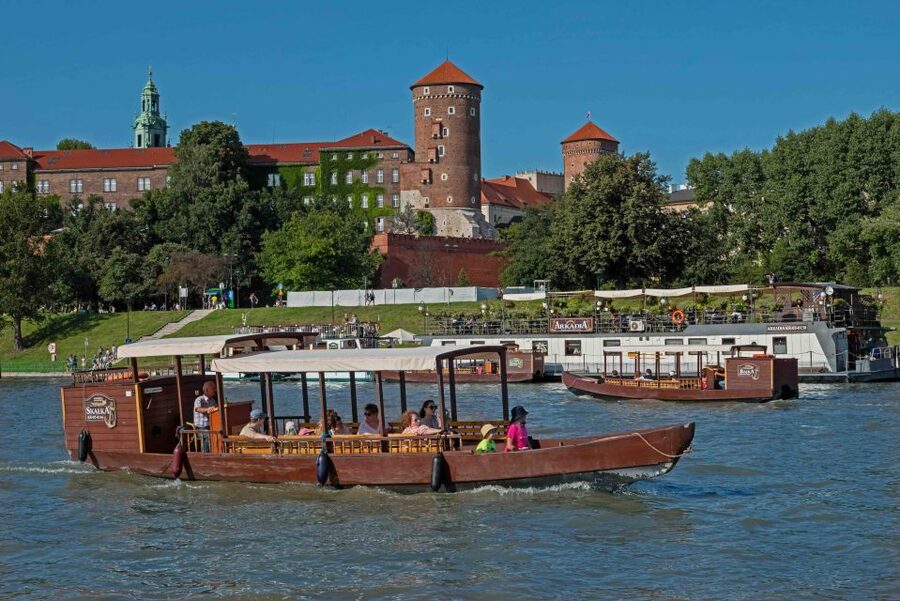 Krakow: Private Traditional Gondola Cruise - Boarding your 12-person wooden gondola on the Vistula