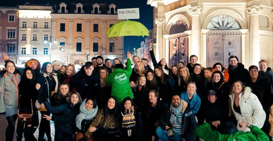 Krakow: Pub, Bar & Club Crawl - Getting started at plac Mariacki and finding your bright green host