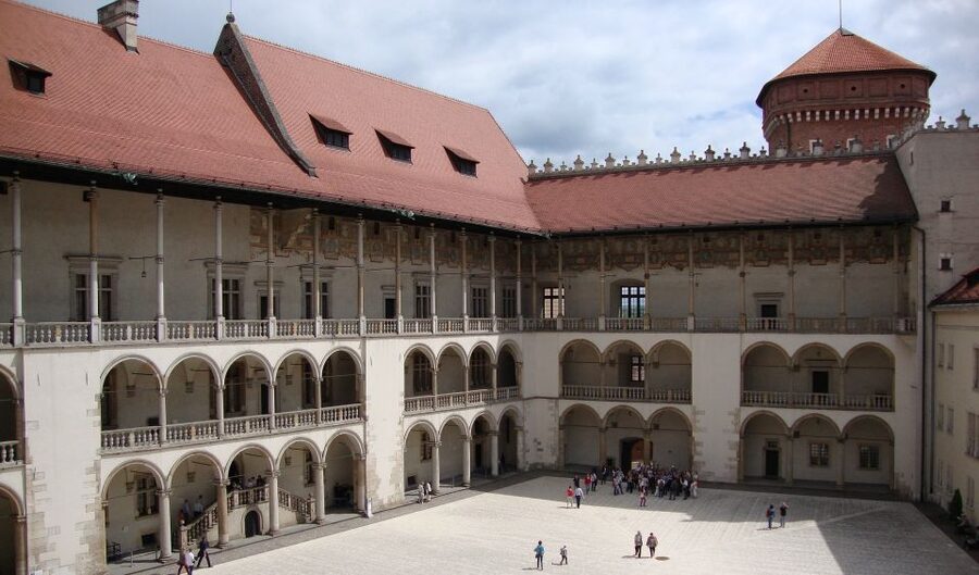 Krakow: Skip-the-Line Wawel Castle & Old Town Guided Tour - Cloth Hall and the medieval marketplace vibe