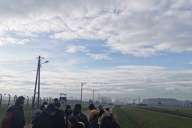Krakow to Auschwitz Birkenau Guided Tour with Transfer and Ticket - Headsets, group size, and why pacing can feel strict