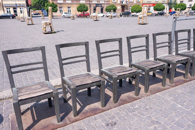 Schindler's Factory and Jewish Ghetto Walking Tour in Kraków - Stop 3: Ghetto Heroes Square and the Chair Memorial