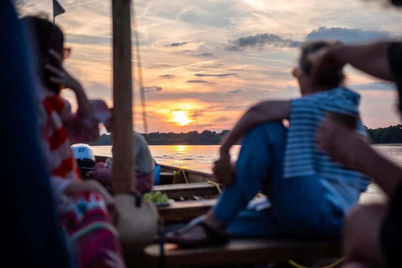 Toruń: Sunset on the Vistula From a Traditional Boat. - Traditional wooden Vistula boats and why the ride feels slow in a good way