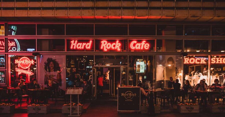 Warsaw: Lunch or dinner at Hard Rock Cafe with Skip-the-Line - The Museum of Rock setup, nearly 300 items you can scan fast