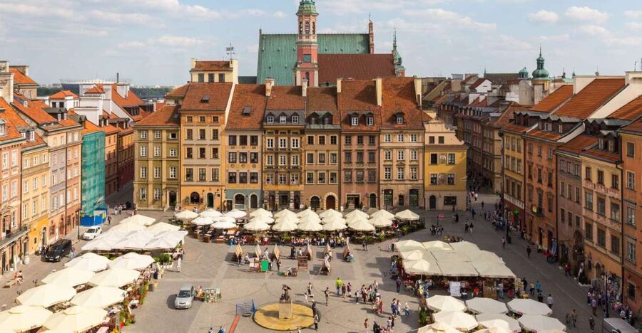 Warsaw: Old Town Guided Walking Tour - The narrowest house façade and the Old Town architecture game