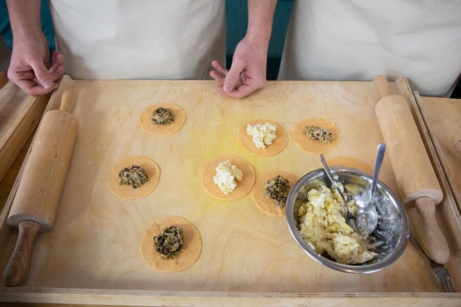 Warsaw: Polish Dumplings Cooking Class - Mixing and kneading pierogi dough: the step that makes everything easier