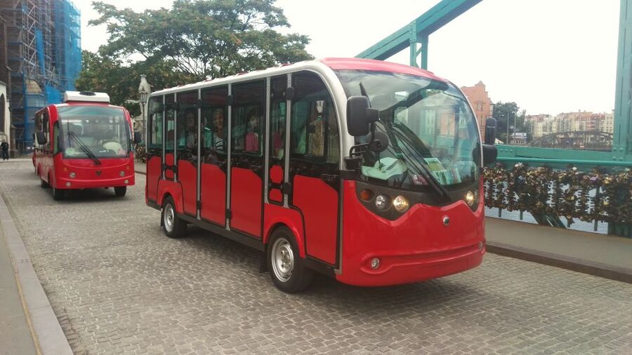 Wroclaw: 2-Hour Private Electric Bus Tour with Guide or Tape - Back along the Oder, the shoe bridge, and St. Mary Magdalene legends