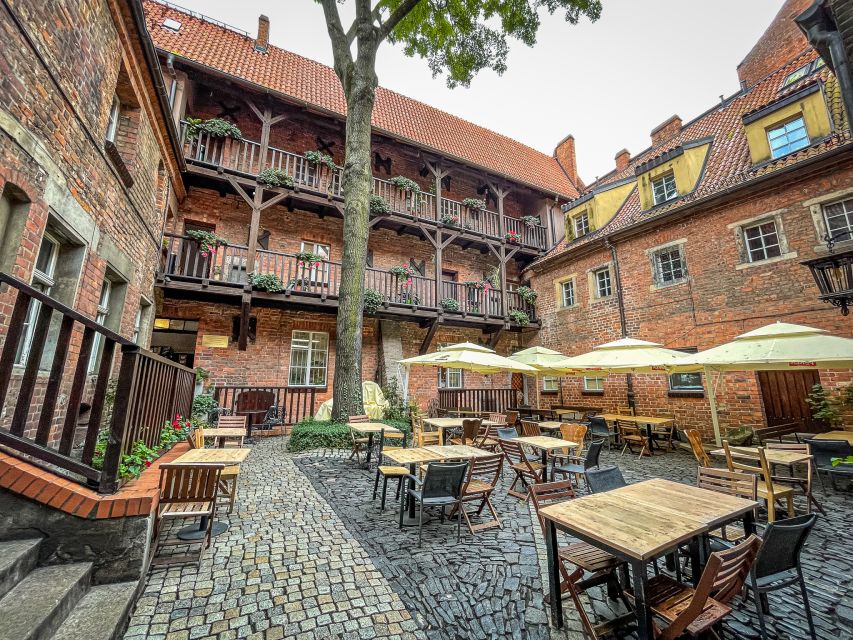 Wrocław: Old Town and Ostrów Tumski Walking Tour in English - Crossing Toward Ostrów Tumski by Bridge Views